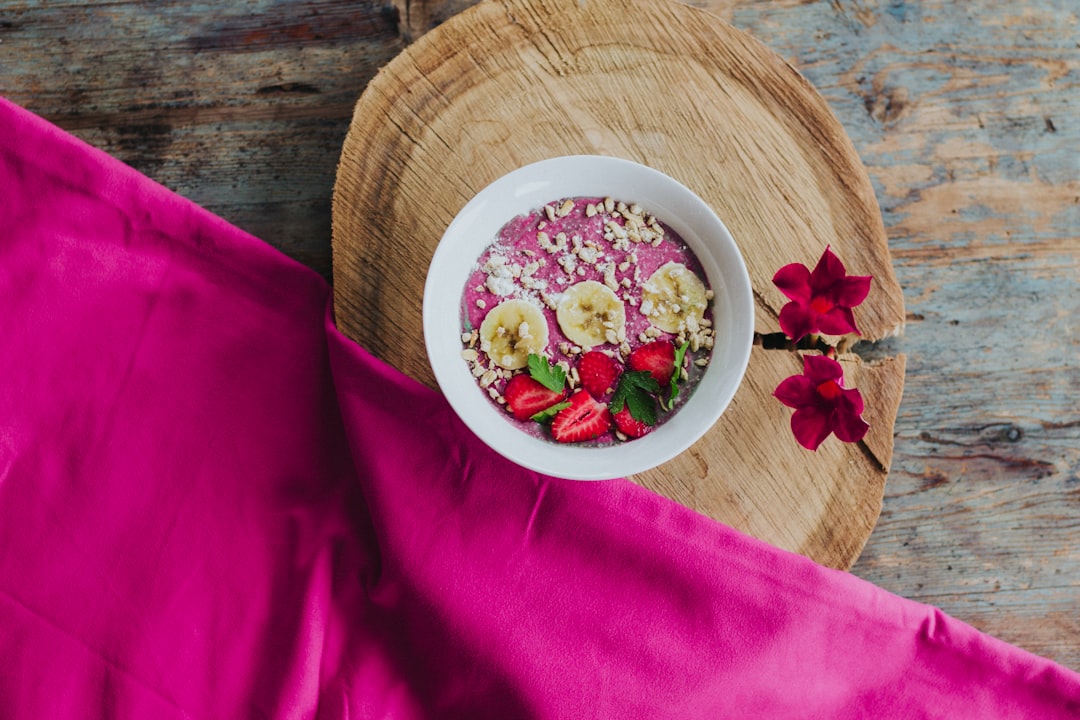 strawberry and banana slices on bowl