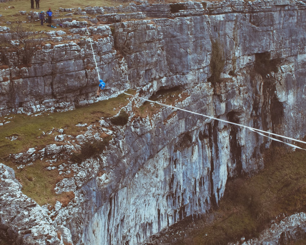 aerial view photography of person doing rope balancing