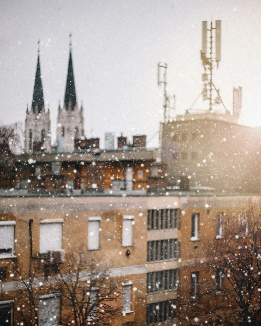 photo of a snow weather and brown concrete building