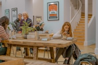 A vibrant coffee shop scene where people read pickflow content on tablets.