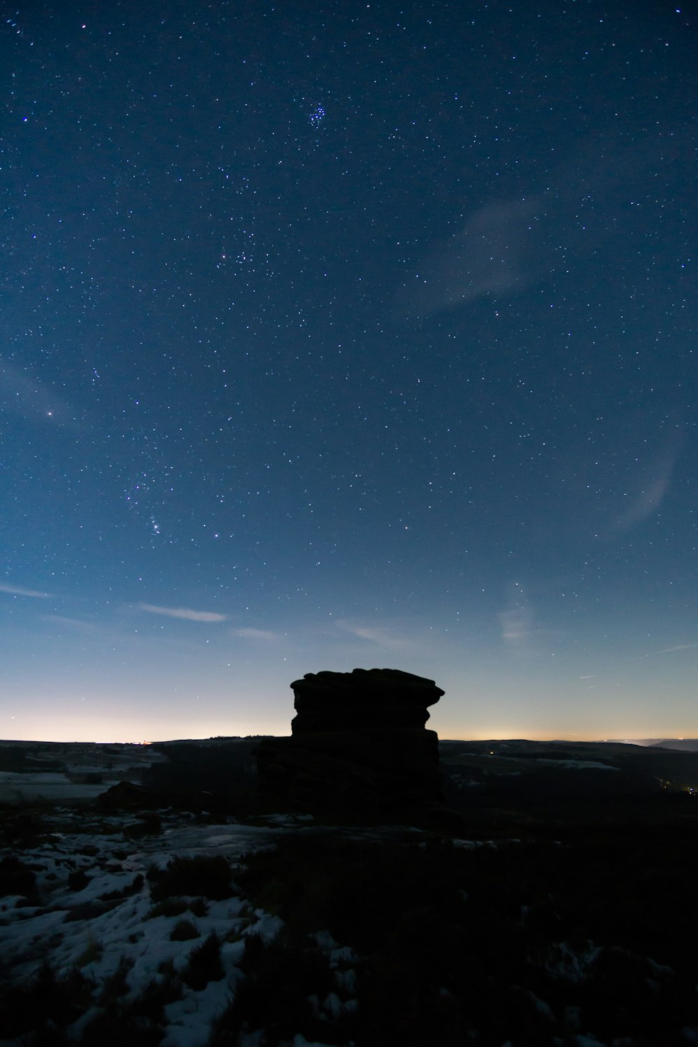 silhouette photography of cliff