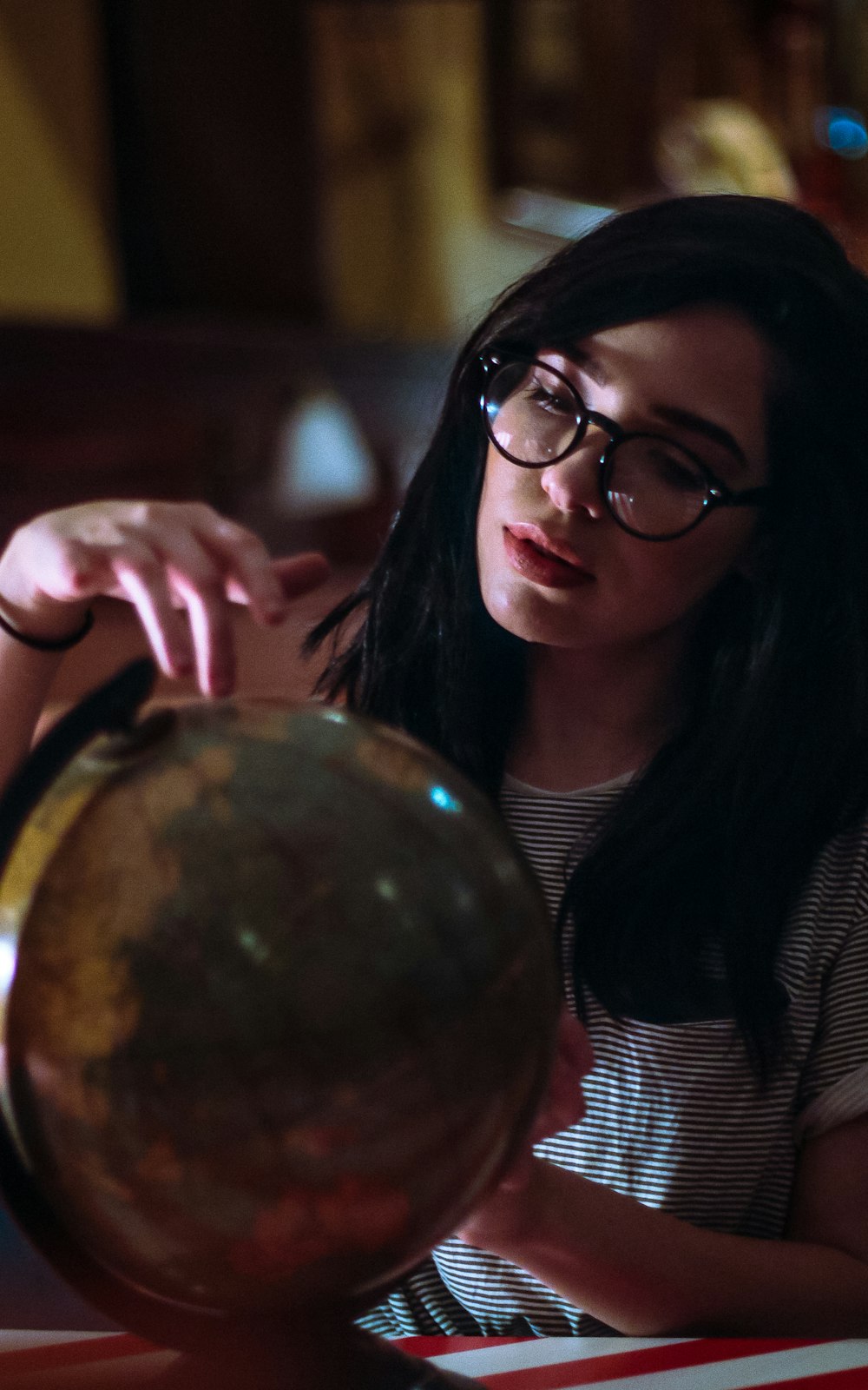 woman holding earth globe