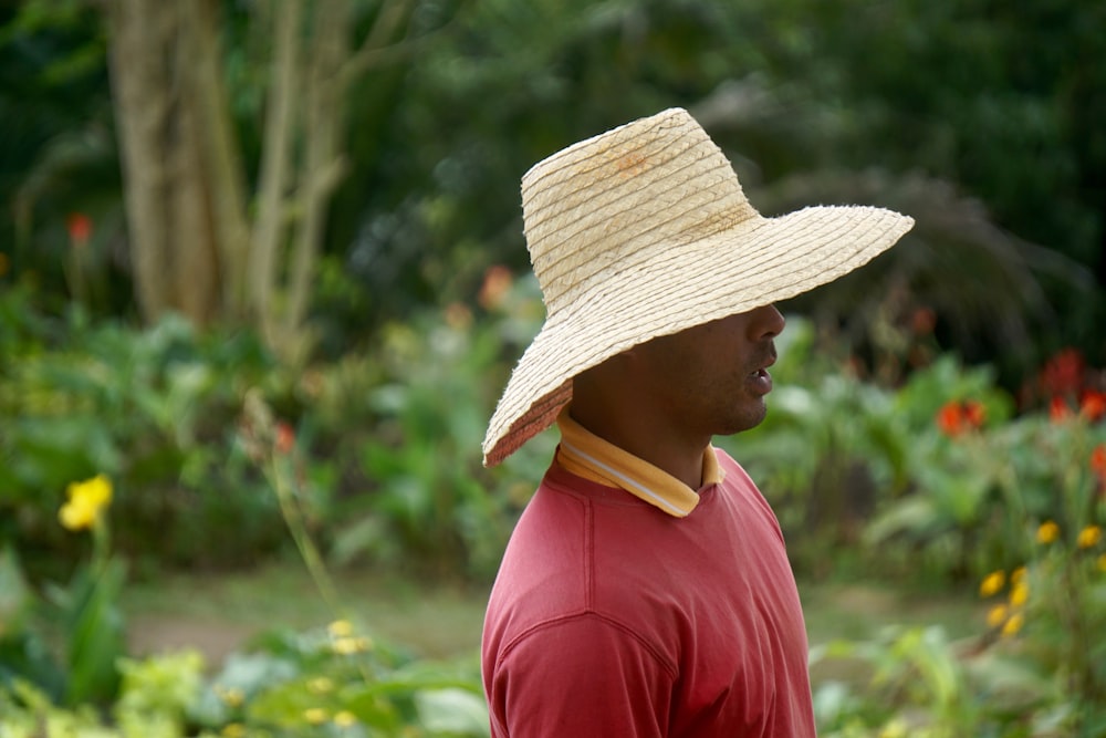 man standing near garden