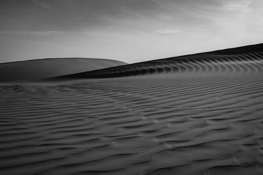 grayscale photography of sand