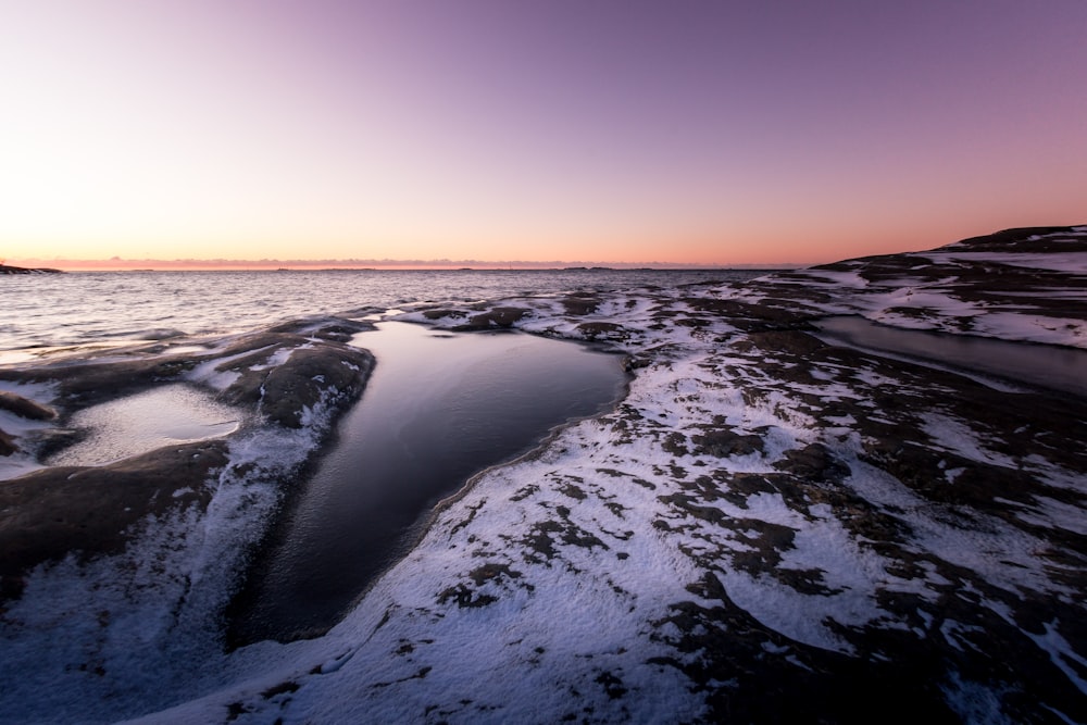 snowy fields with ponds