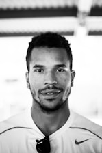 Portrait of Marcos Wilian da Silva Oliveira, managing partner of the company, in a professional setting.