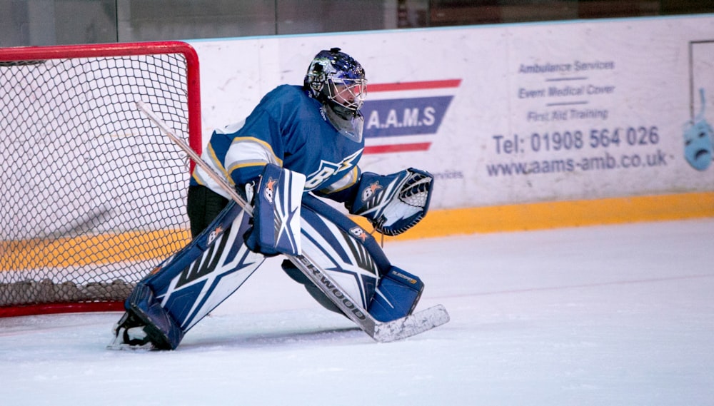 ice hockey goalie defending the goal