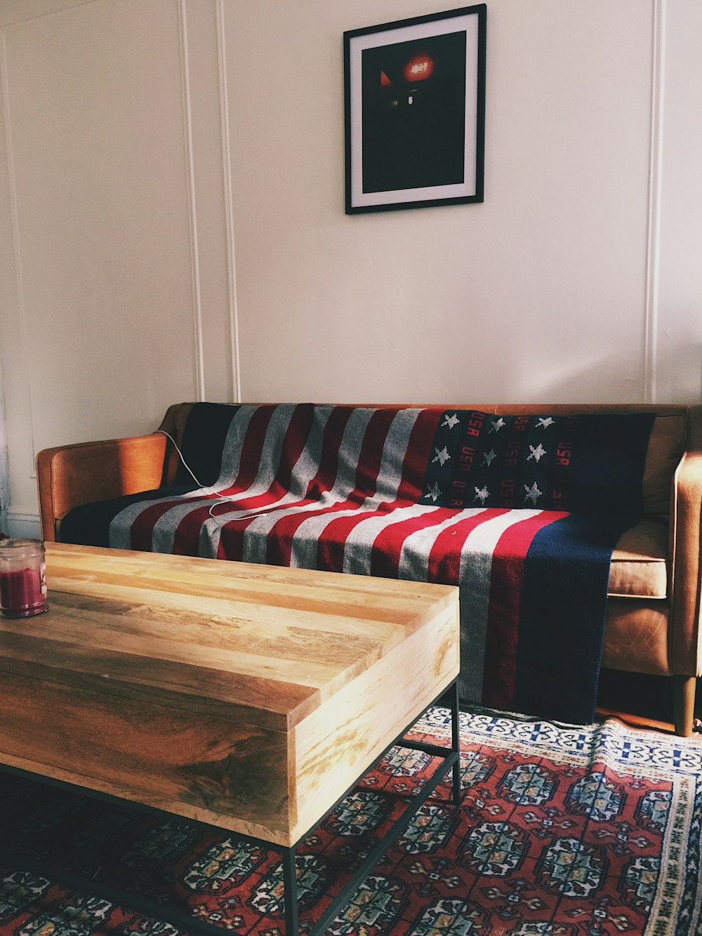 brown sofa near coffee table