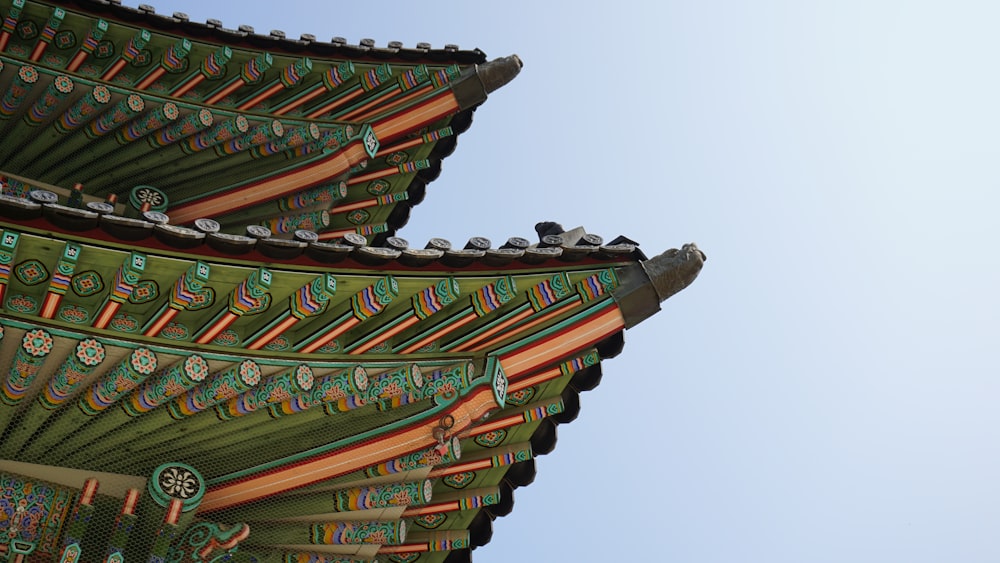green and black pagoda roof