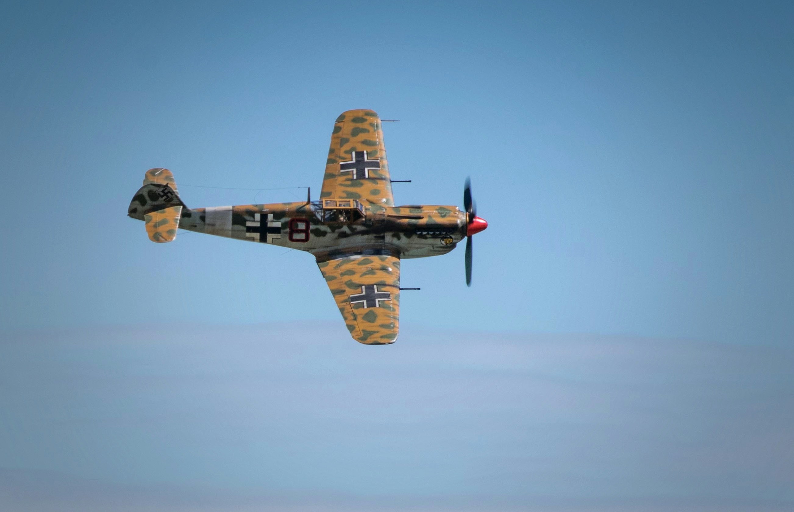 brown fighter plane above clouds, Bf109 Buchon at the Flying Legends Airshow 2017
