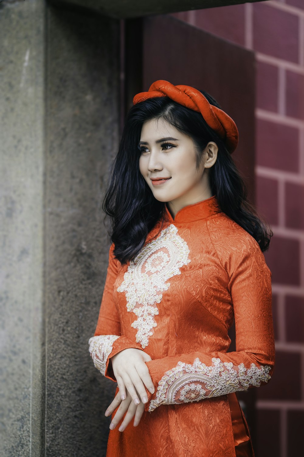 woman wearing red floral long-sleeved dress