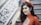 woman wearing red cheongsam top near stair
