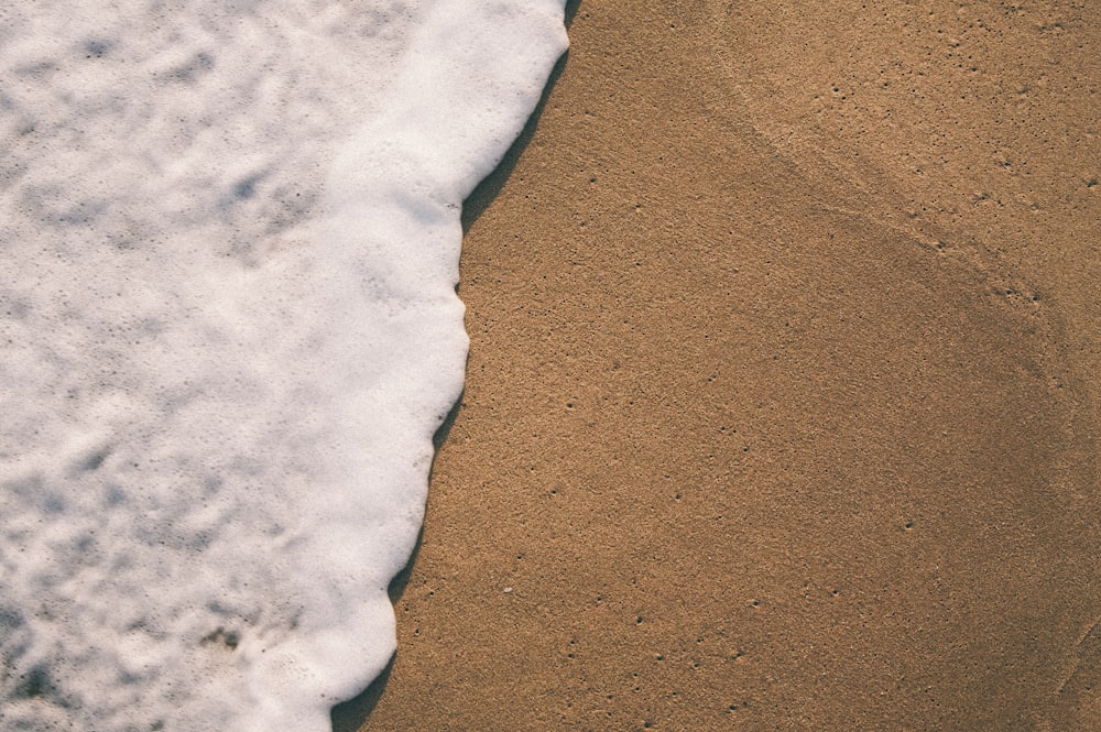 sea foam on sand