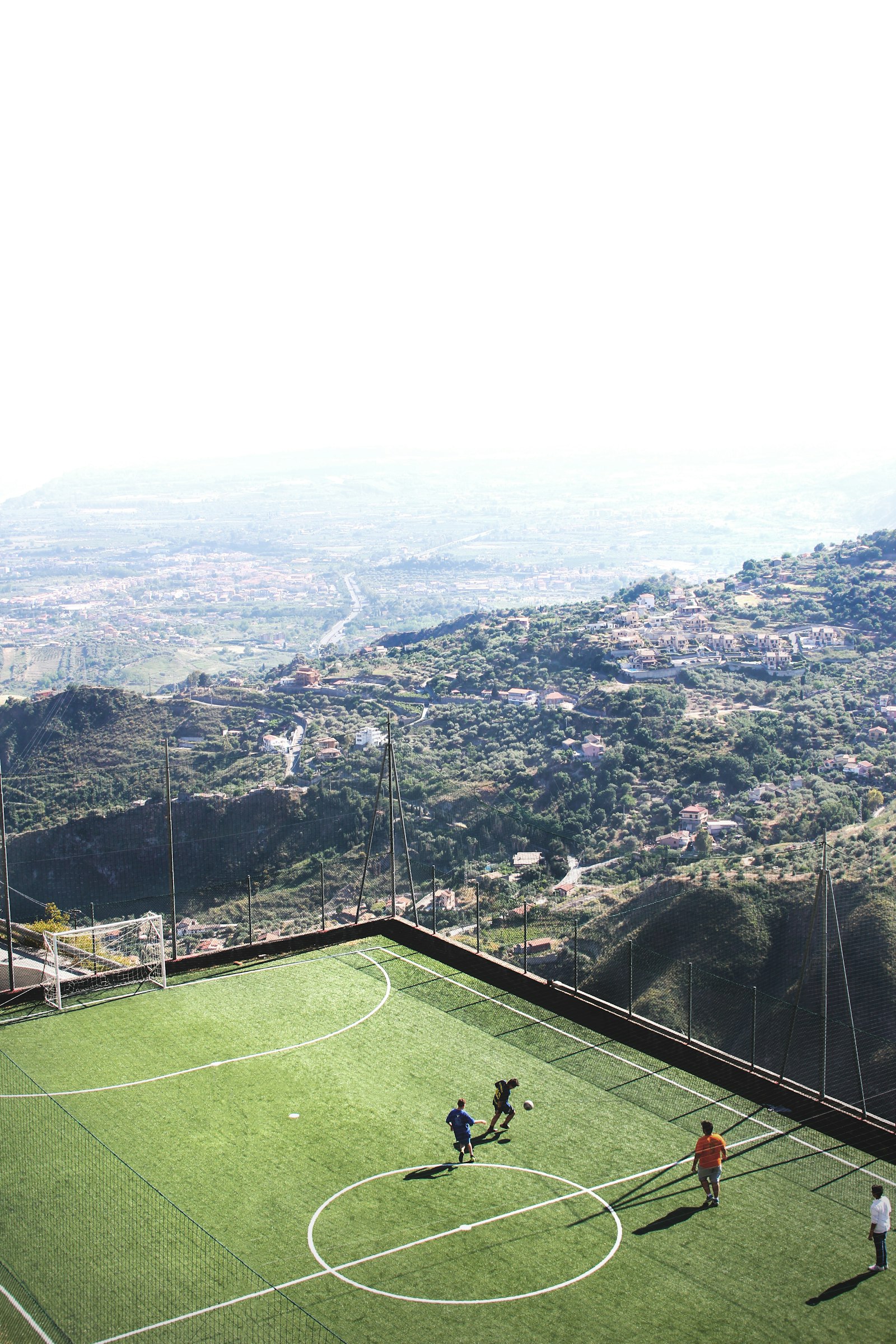 Canon EOS 60D + Sigma 30mm F1.4 EX DC HSM sample photo. Men playing soccer during photography