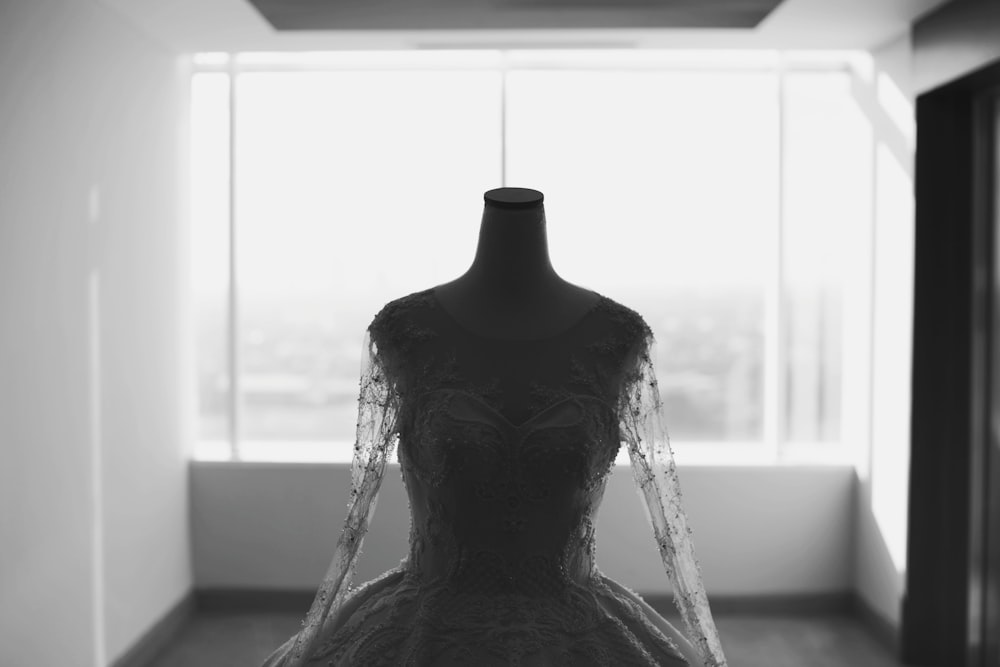 grayscale photo of wedding dress