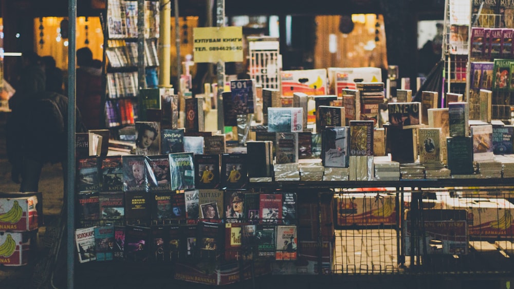 assorted books on rack