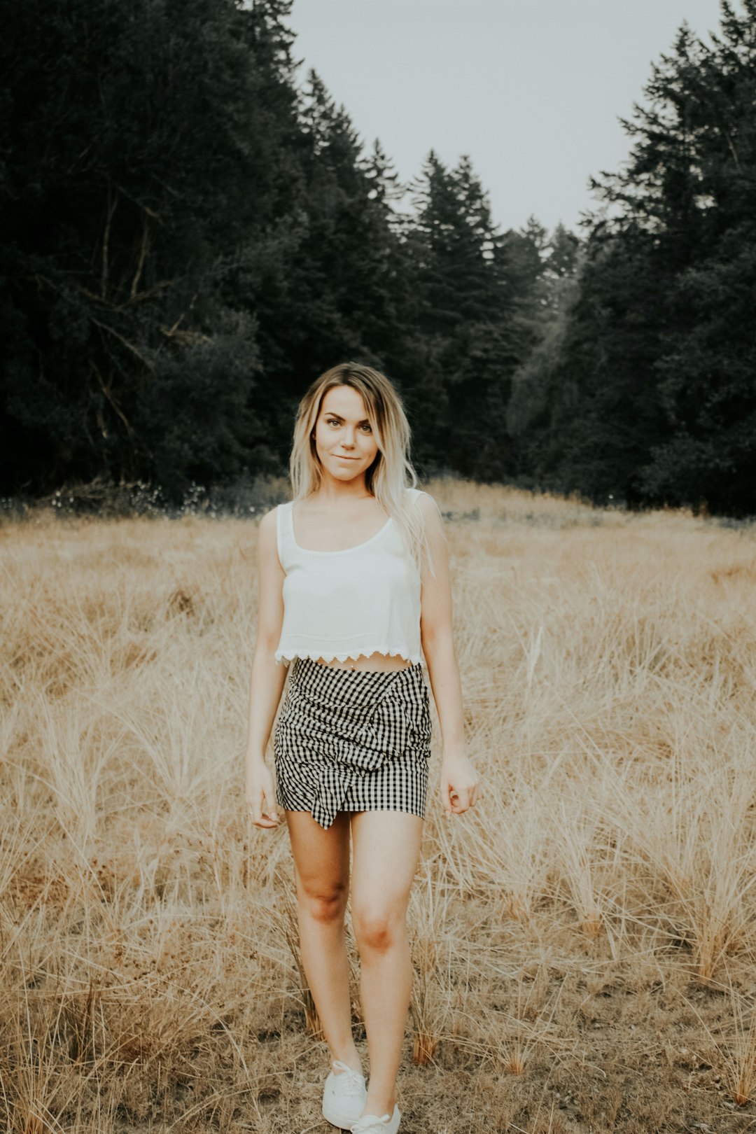 woman standing on grass field