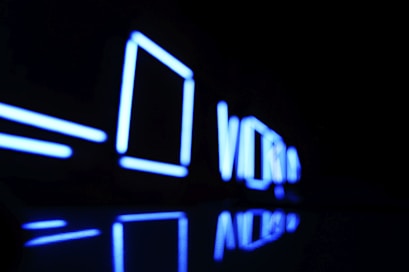 Abstract neon shapes and lines forming a dynamic futuristic animation frame.