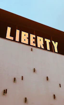 A welcoming office reception area with the Liberty Group of Companies logo prominently displayed.