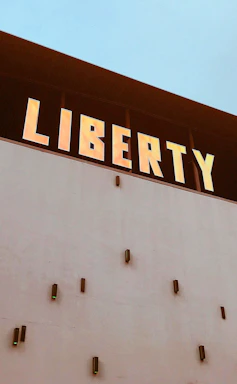 A welcoming office reception area with the Liberty Group of Companies logo prominently displayed.