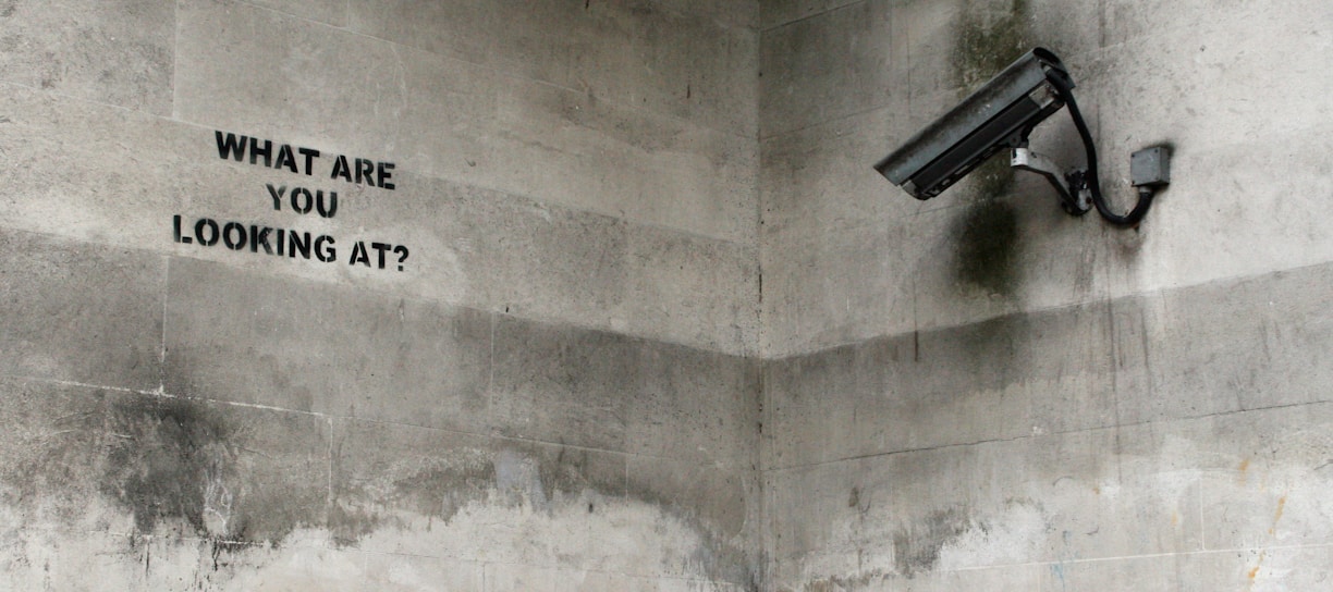 black CCTV camera on wall