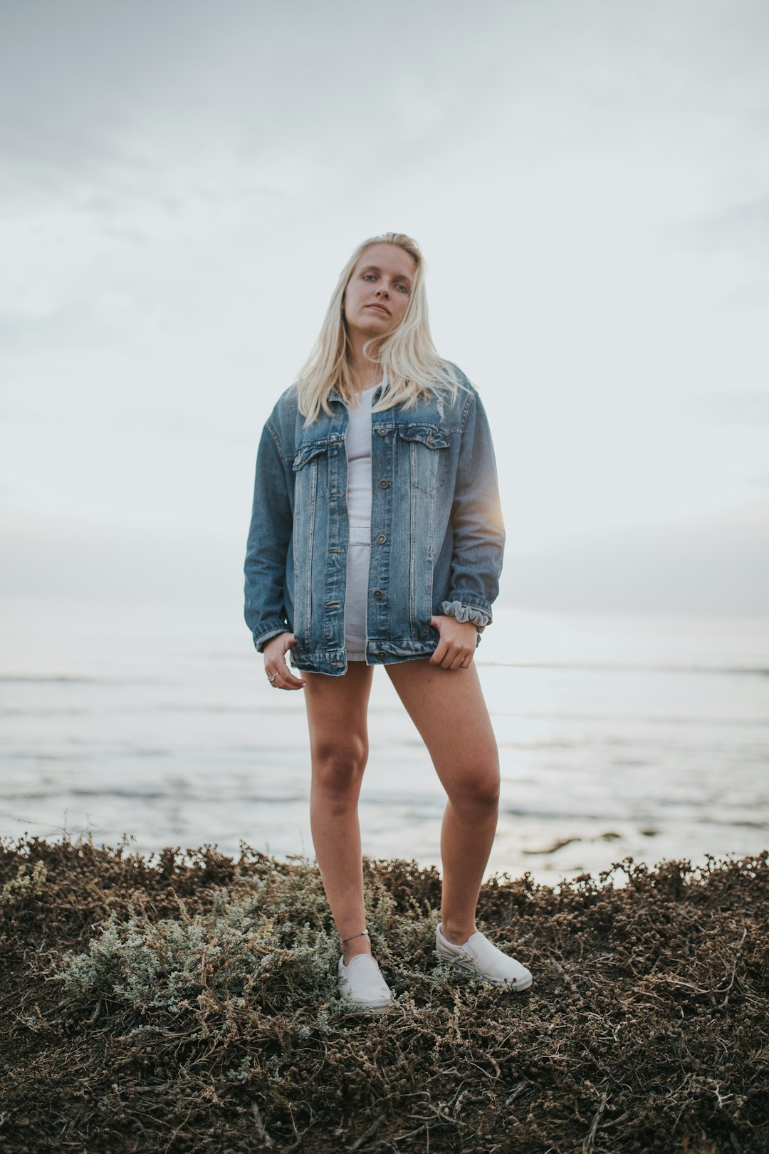 woman standing on seashore