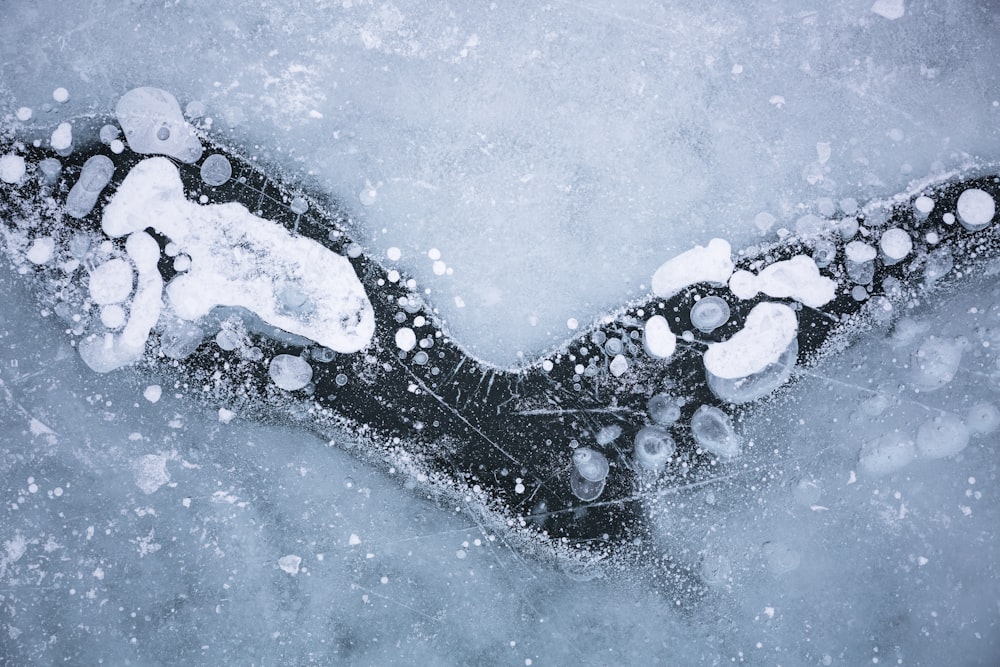 a person's feet are covered in snow