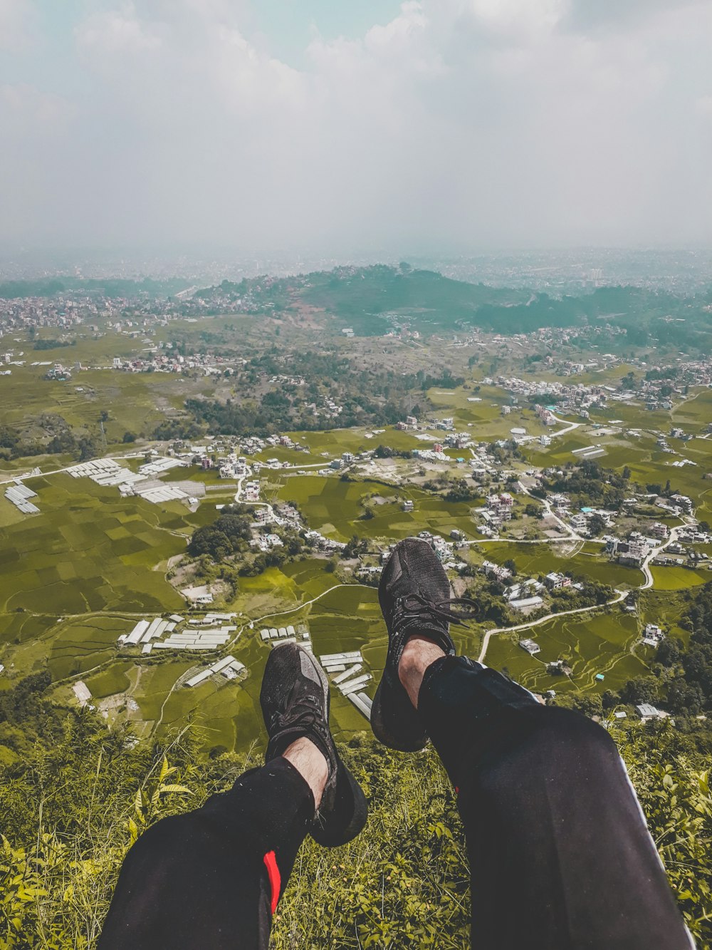 aerial photography of town and mountain