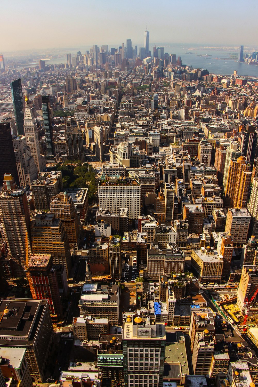 city near body of water during daytime aerial photography