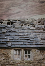 gray and brown brick wall house