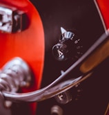 red and black electric guitar