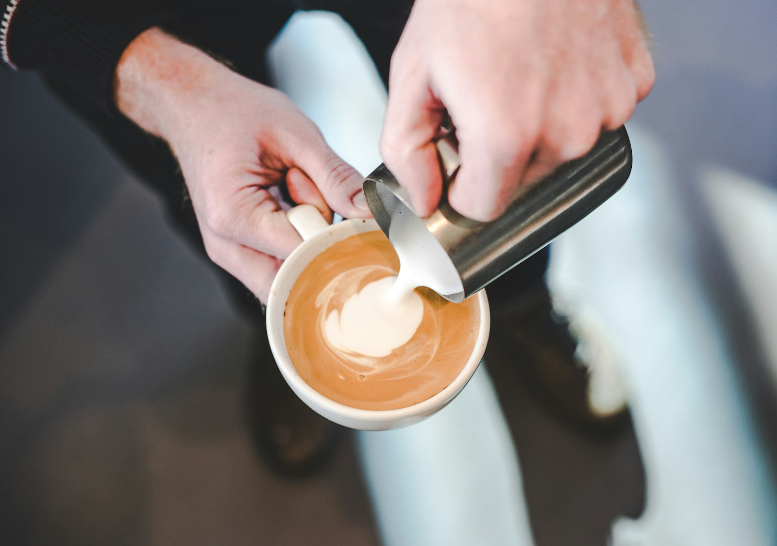 Sony a7S II + Canon EF 50mm F1.8 II sample photo. Person pouring milk in photography