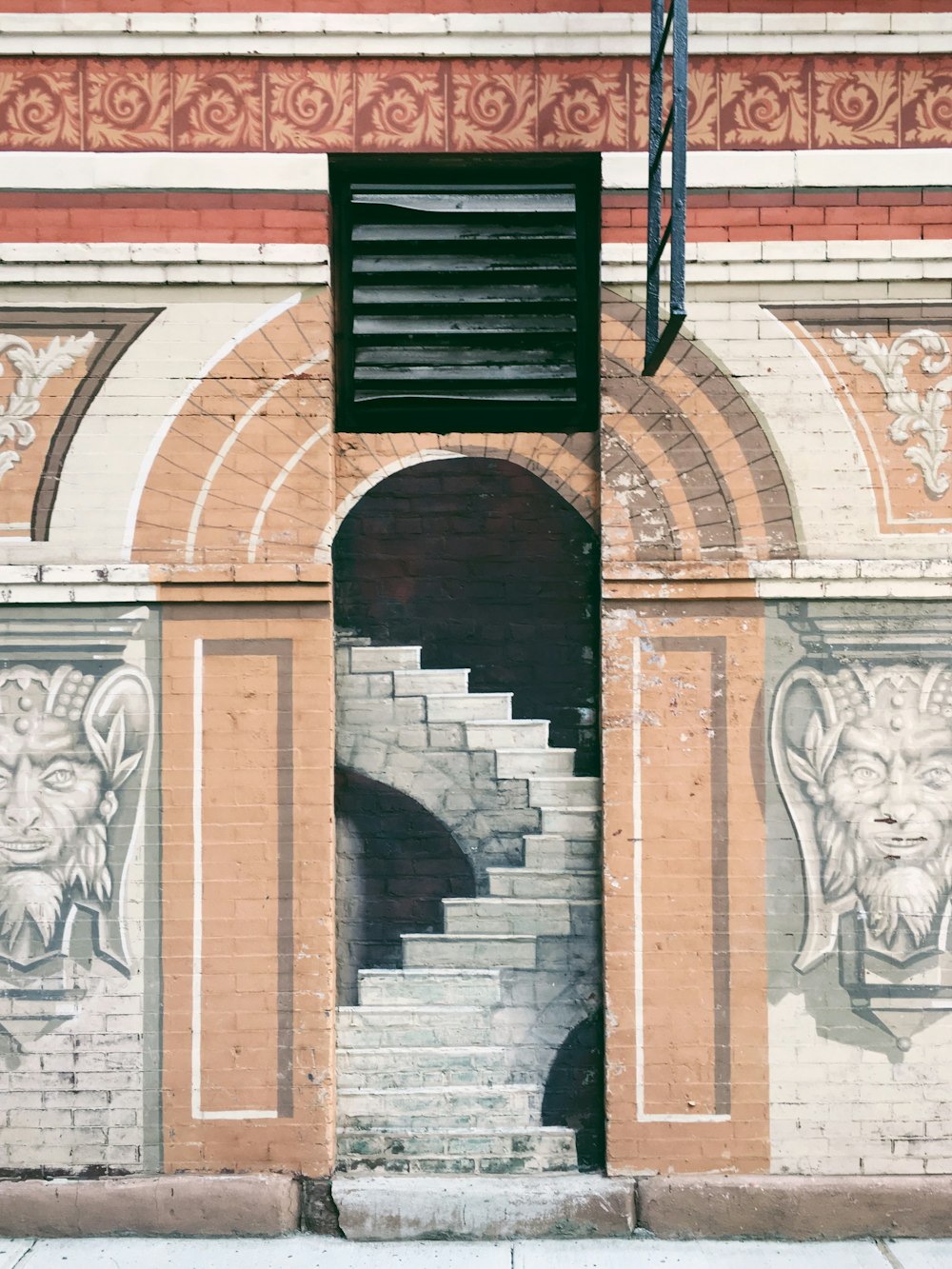 arch hallway and stair graffiti