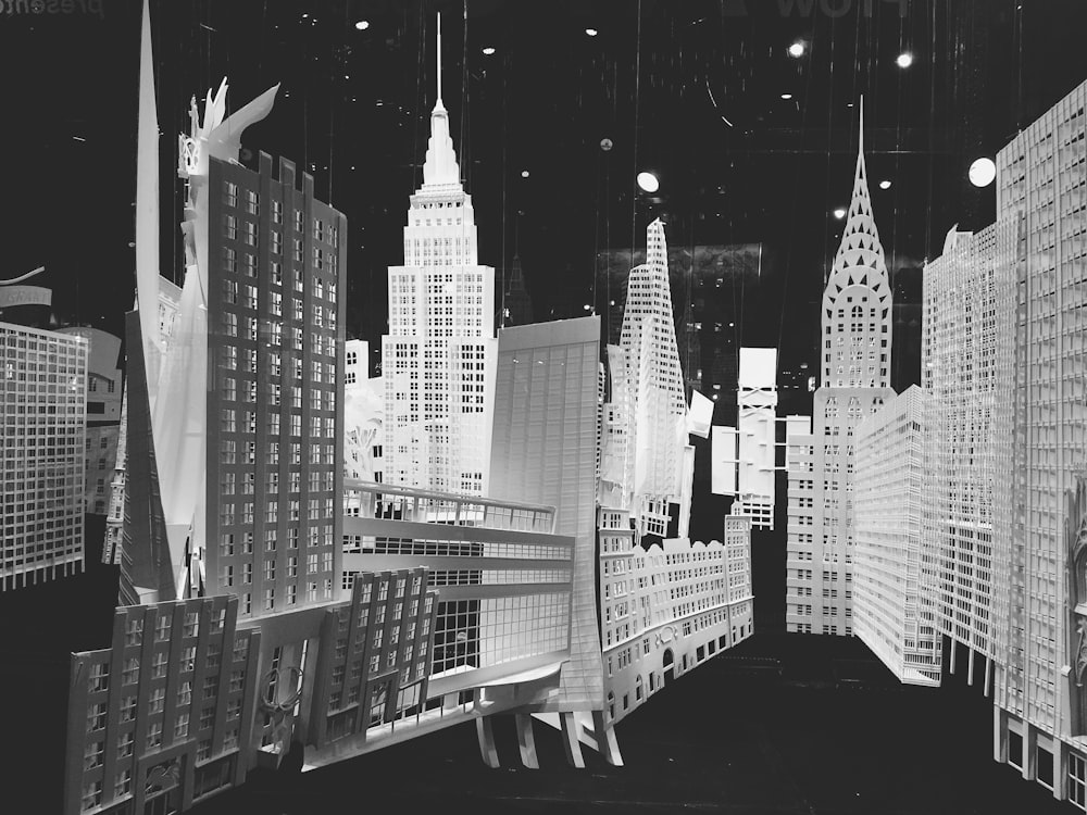 city buildings in grayscale photography