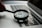 magnifying glass near gray laptop computer
