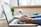 person typing on silver MacBook