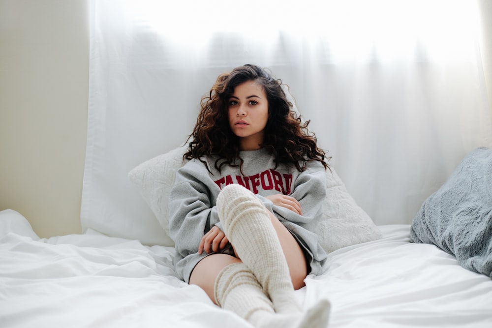 woman lying on bed