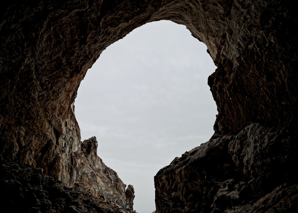 worms eye view of cave during daytiime