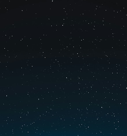 a night sky with stars and the moon