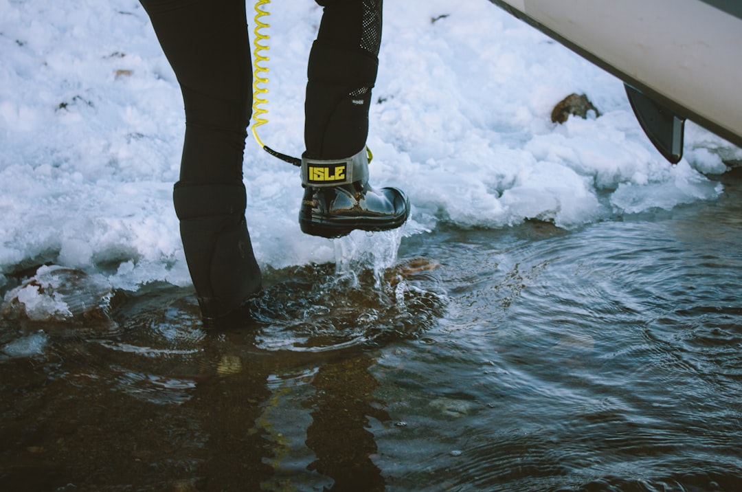 person about to step on ice path