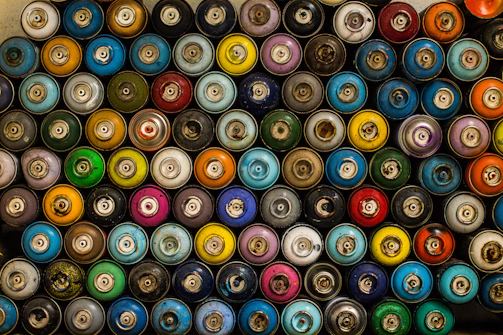 Close-up of high-quality paint spray guns arranged neatly.