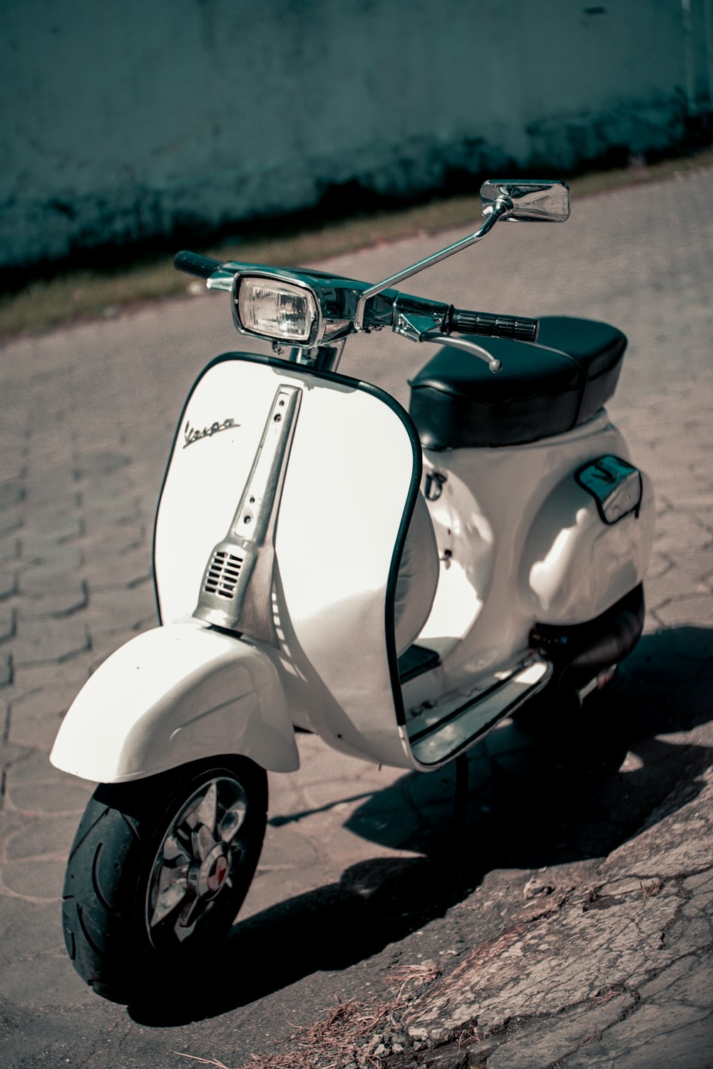 white and black motor scooter