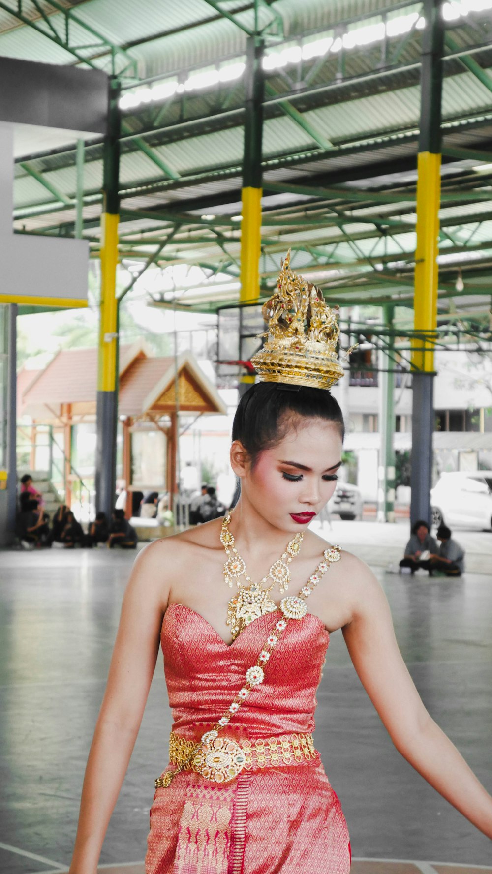 brass crown on woman head