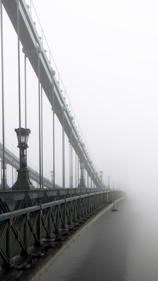closeup photo of bridge and mist in Széchenyi Chain Bridge Hungary