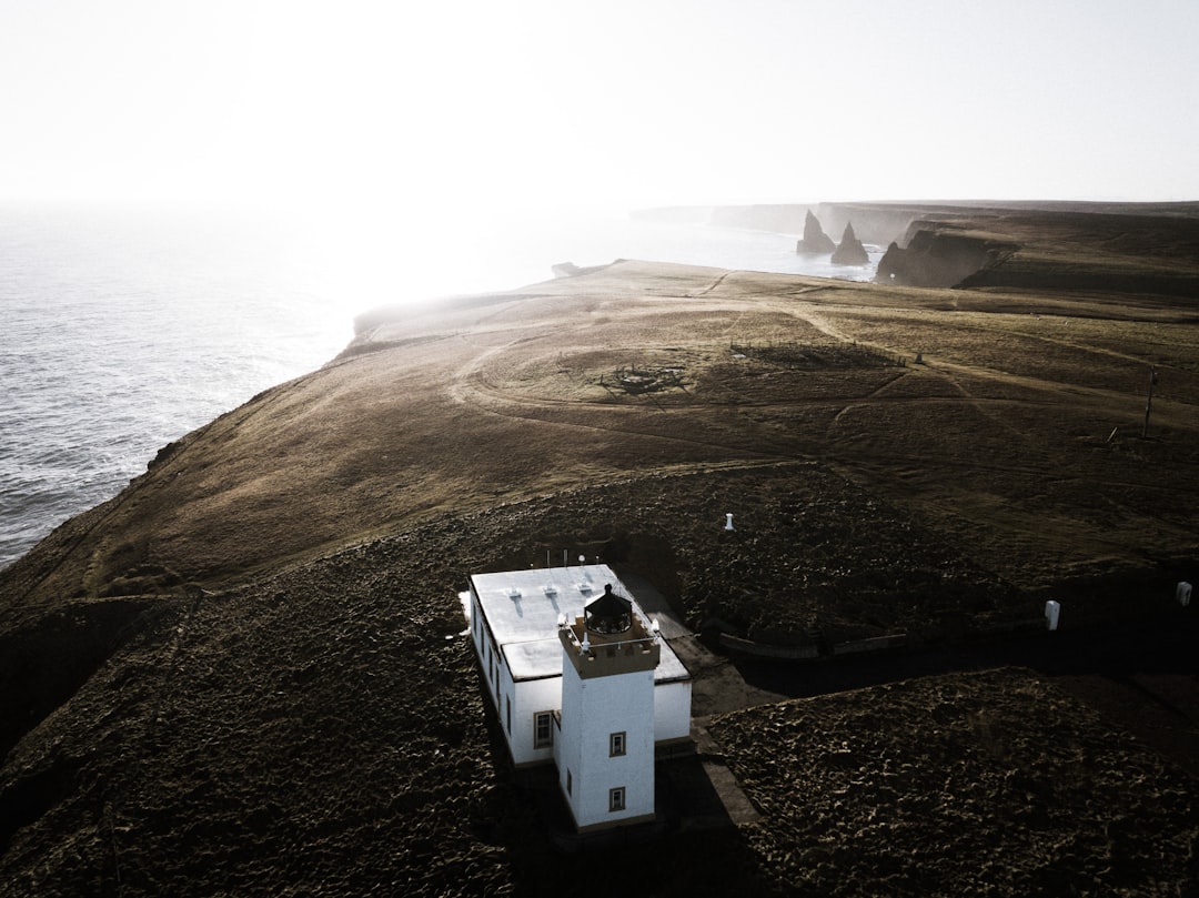  aerial photo of white house near body of water wick