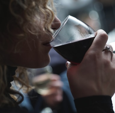 woman drinking glass of wine