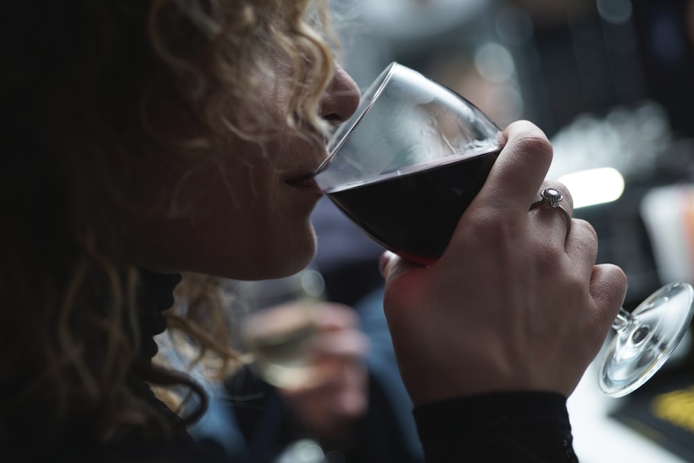 woman drinking glass of wine