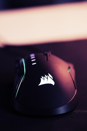 A high-precision gaming mouse featuring personalized engraving and color accents.