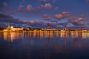 Evening cityscape of Parramatta with soft lights glowing, reflecting a calm and welcoming atmosphere.