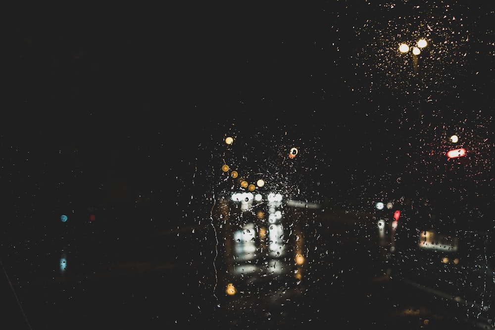 a rainy night with street lights and street lights